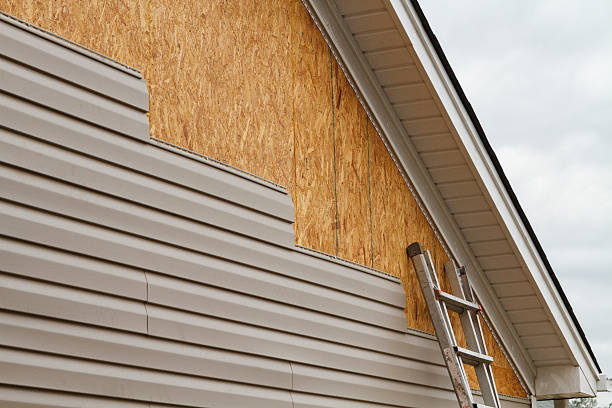 Professional Siding Installation technician working in Maidens, VA